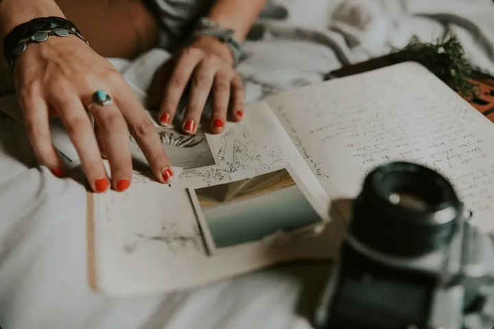 Planning a shoot: notes and a camera on a desk